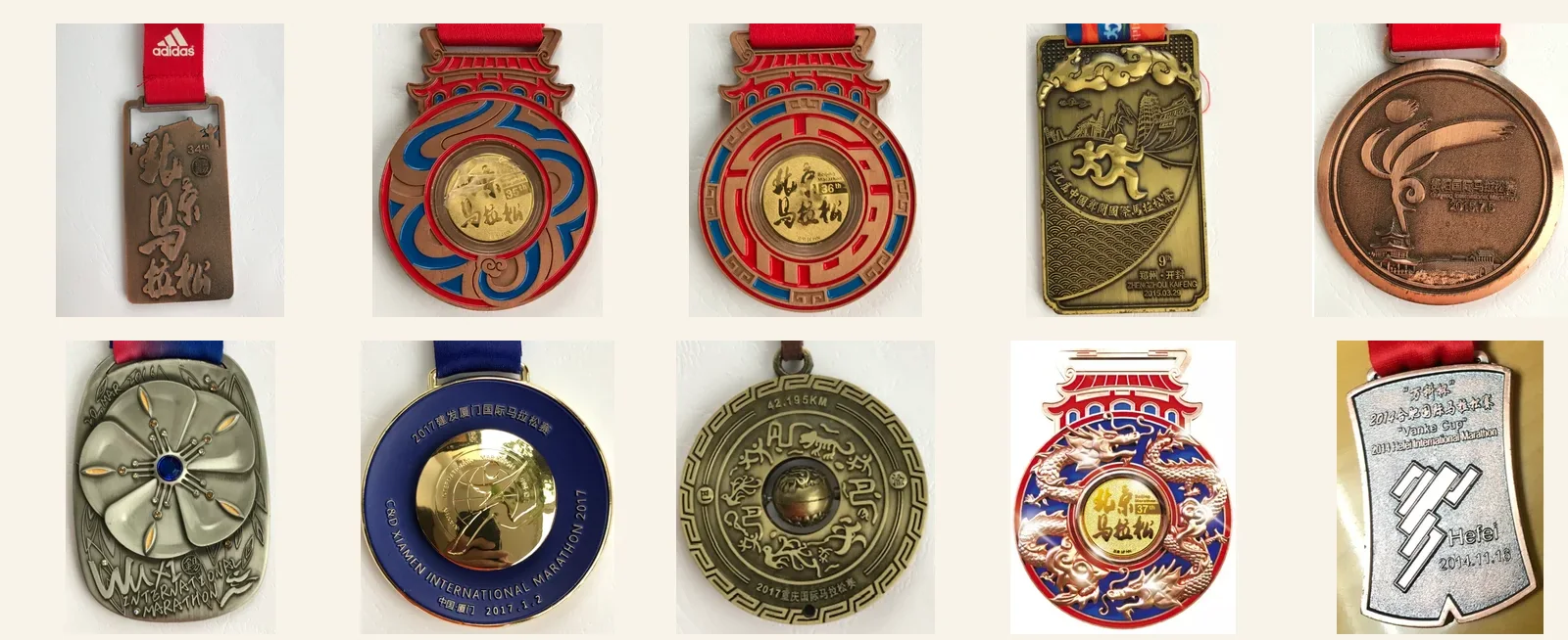 A collection of marathon finisher medals from Xiao Chaohu’s races